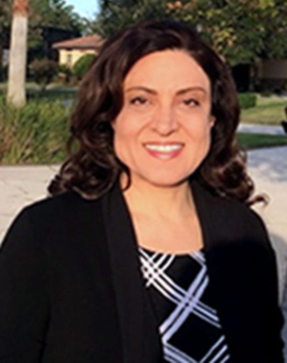 Dr. Marzieh Zahedi, board-certified pediatric dentist and orthodontic provider