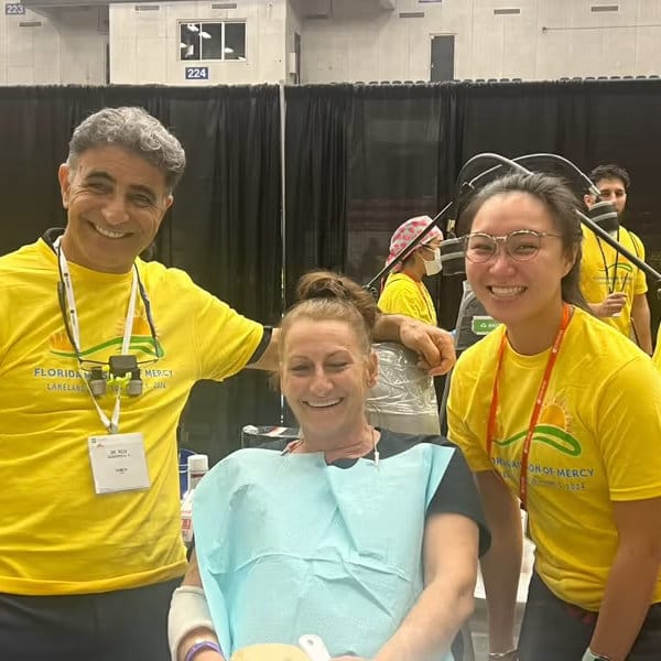 Dr. Azari and team volunteering at the 2024 Florida Mission of Mercy