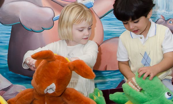 Child learning healthy dental habits