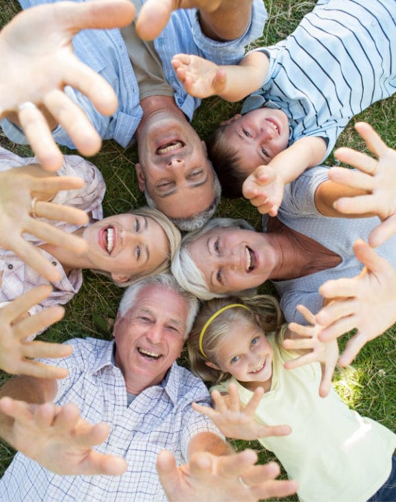 Multi-generational family smiling